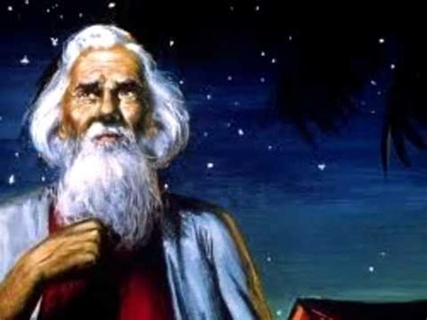 A old white haired man in a beard and 1st century clothing looking up at the night sky.
