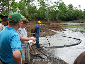 <B>Rep. Jim McGovern observes the cleaning of an oil spill</B>